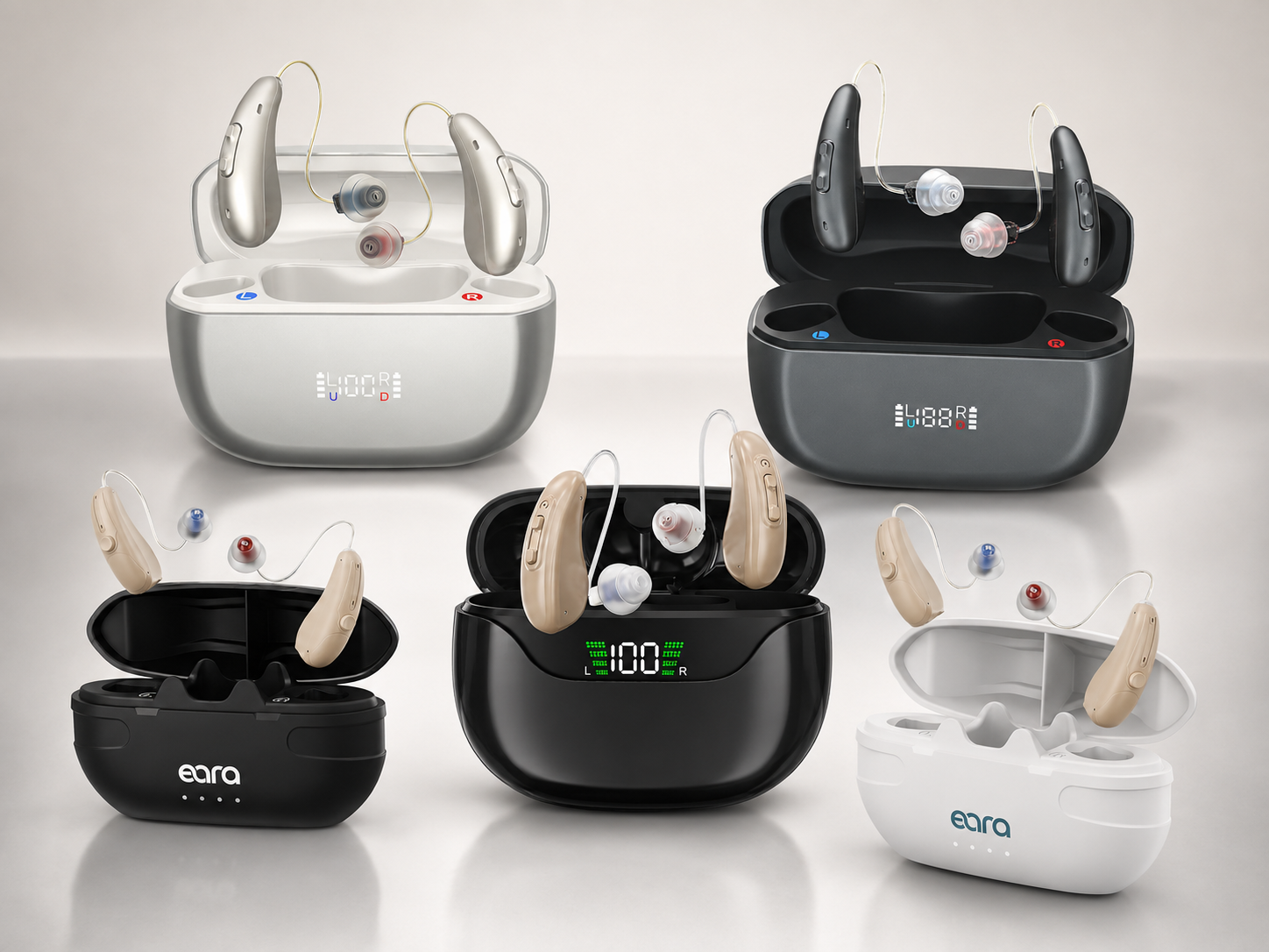 Five pairs of behind-the-ear hearing aids with their open charging cases arranged on a light gray reflective surface. The hearing aids come in beige, white, and dark gray/black colorways, with digital battery levels visible on the cases.