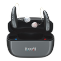 A pair of Eara Ascend Premium Rechargeable behind-the-ear hearing aids in graphite, floating above their open graphite charging case, with two small in-ear tips visible. The hearing aids and case are dark gray to black, and the case front has a small digital display with blue and red indicators.