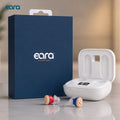 Eara Hearing Eara Clear ITC Rechargeable Hearing aids with a white charging case, shown alongside the navy blue retail box and Eara Clear Hearing Aids.