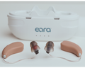 Eara hearing aids with a white case featuring the 'eara' brand on a light background with large power domes on the ends.