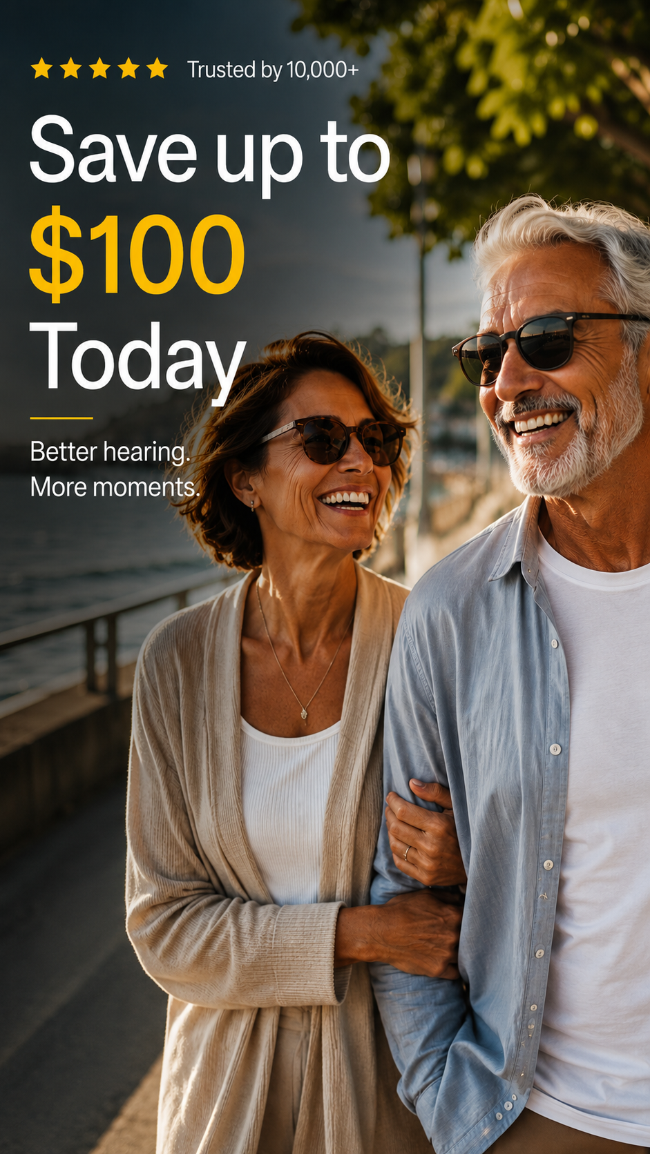 Older couple enjoying a waterfront walk for the Lexie hearing aid support and replacement options page.slider_item_TzCxRc